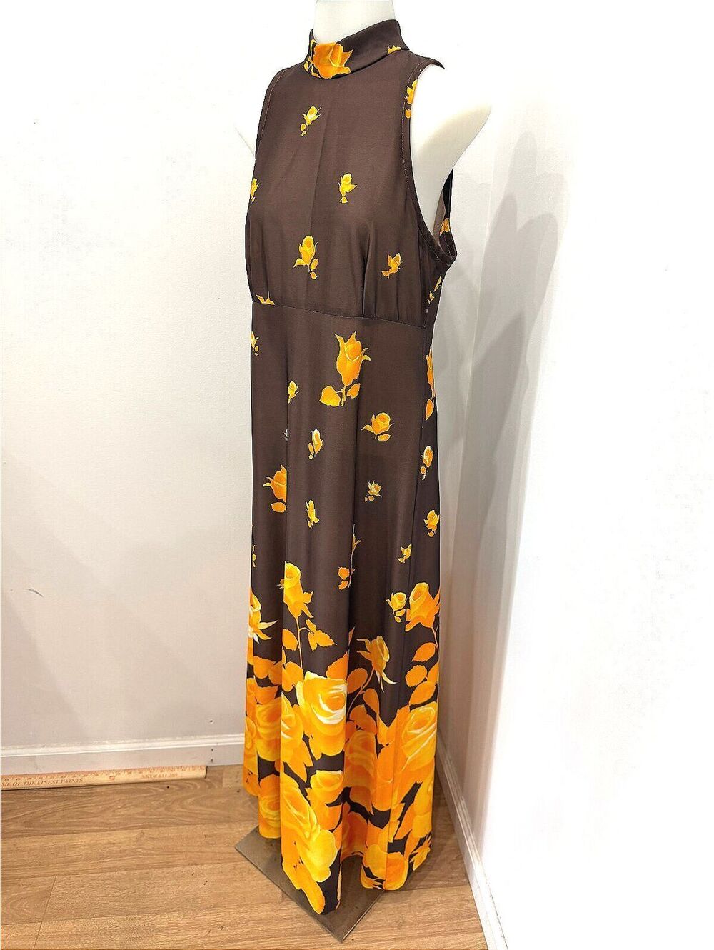 70s Vintage Sleeveless Maxi Dress with Yellow Floral Print on Brown Background